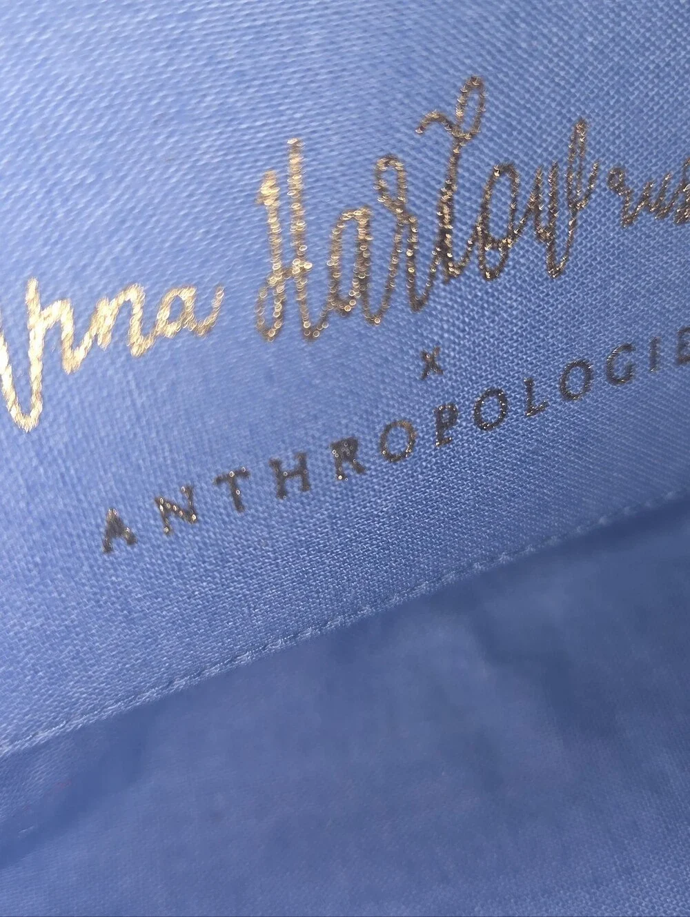 Anthropologie Light Blue Embroidered Floral Tassel Pouch with 'H' Monogram